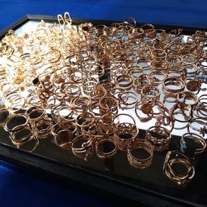 10 Gold rings & Pair of Gold Charm earrings